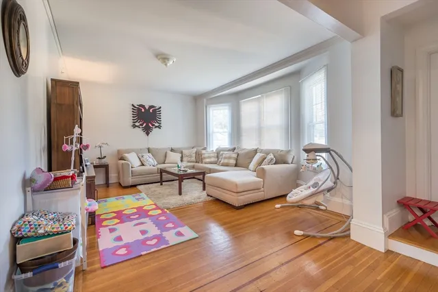 a living room with furniture and a couch