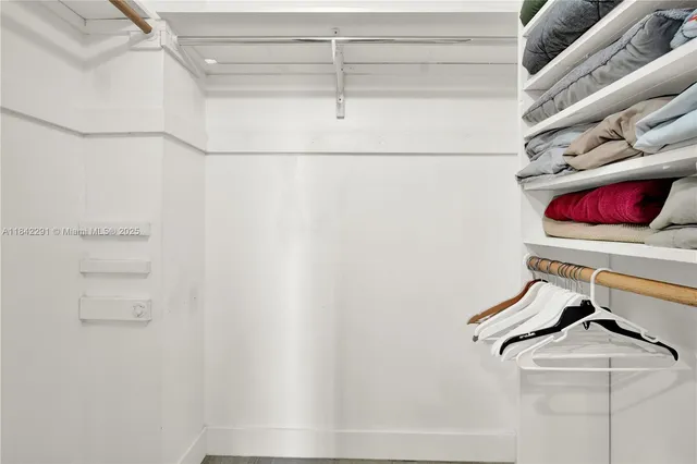 a bathroom with 2 sink and a mirror