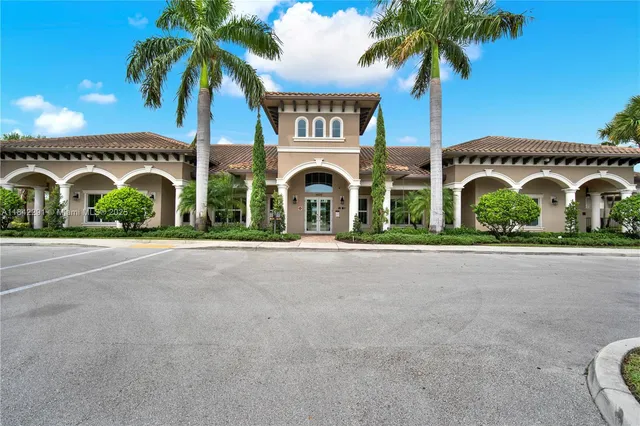 a view of a patio with swimming pool