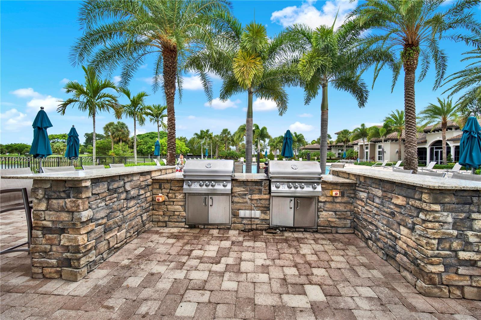 950 Hillcrest Drive, Unit 414 Hollywood, FL 33021 - Photo 35 of 35 a view of a patio with swimming pool