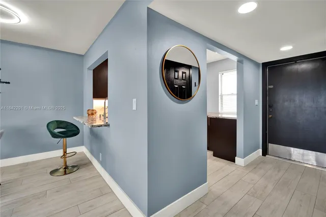 a view of a hallway with a elevator