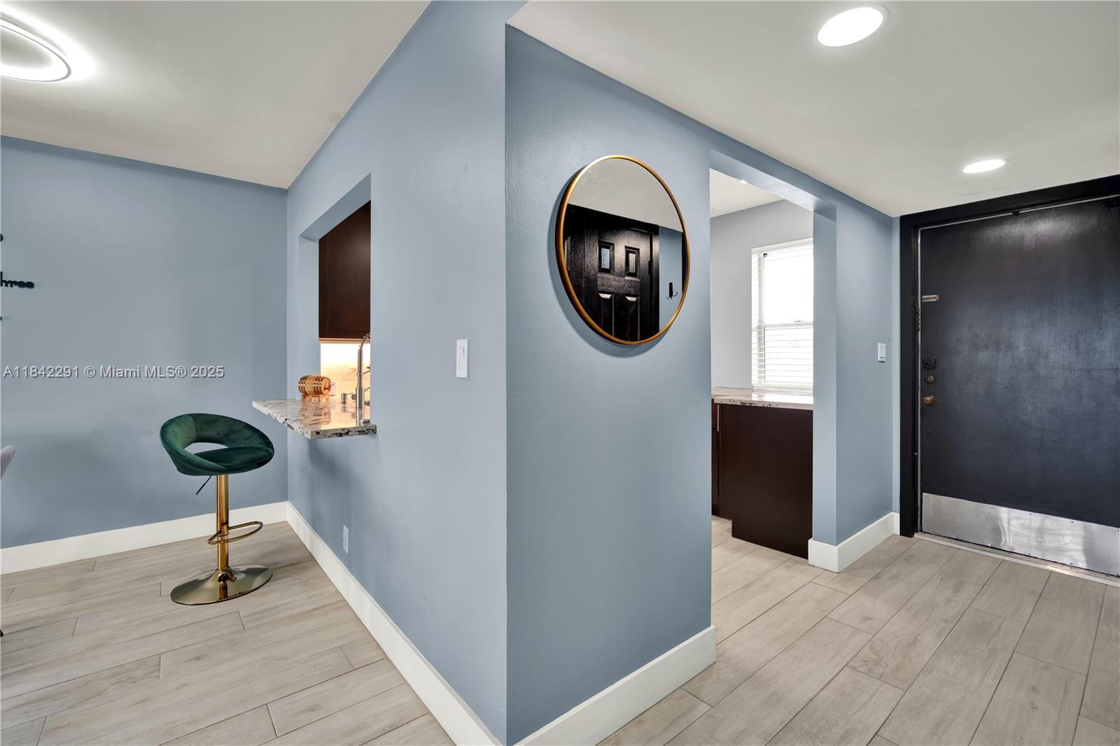 950 Hillcrest Drive, Unit 414 Hollywood, FL 33021 - Photo 9 of 35 a view of a hallway with a elevator