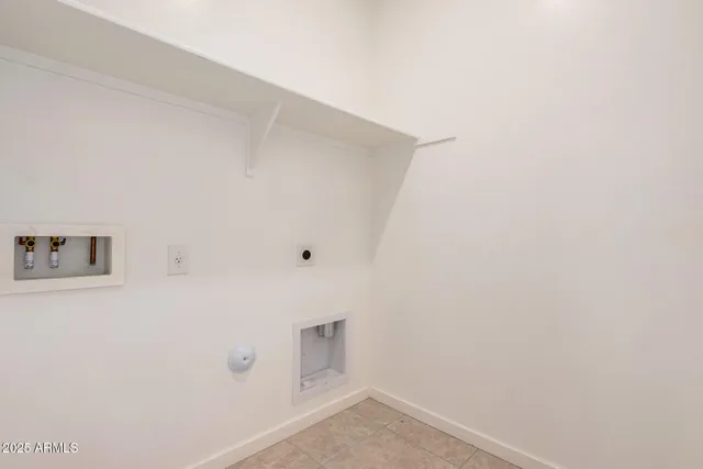 a view of empty room with a garage