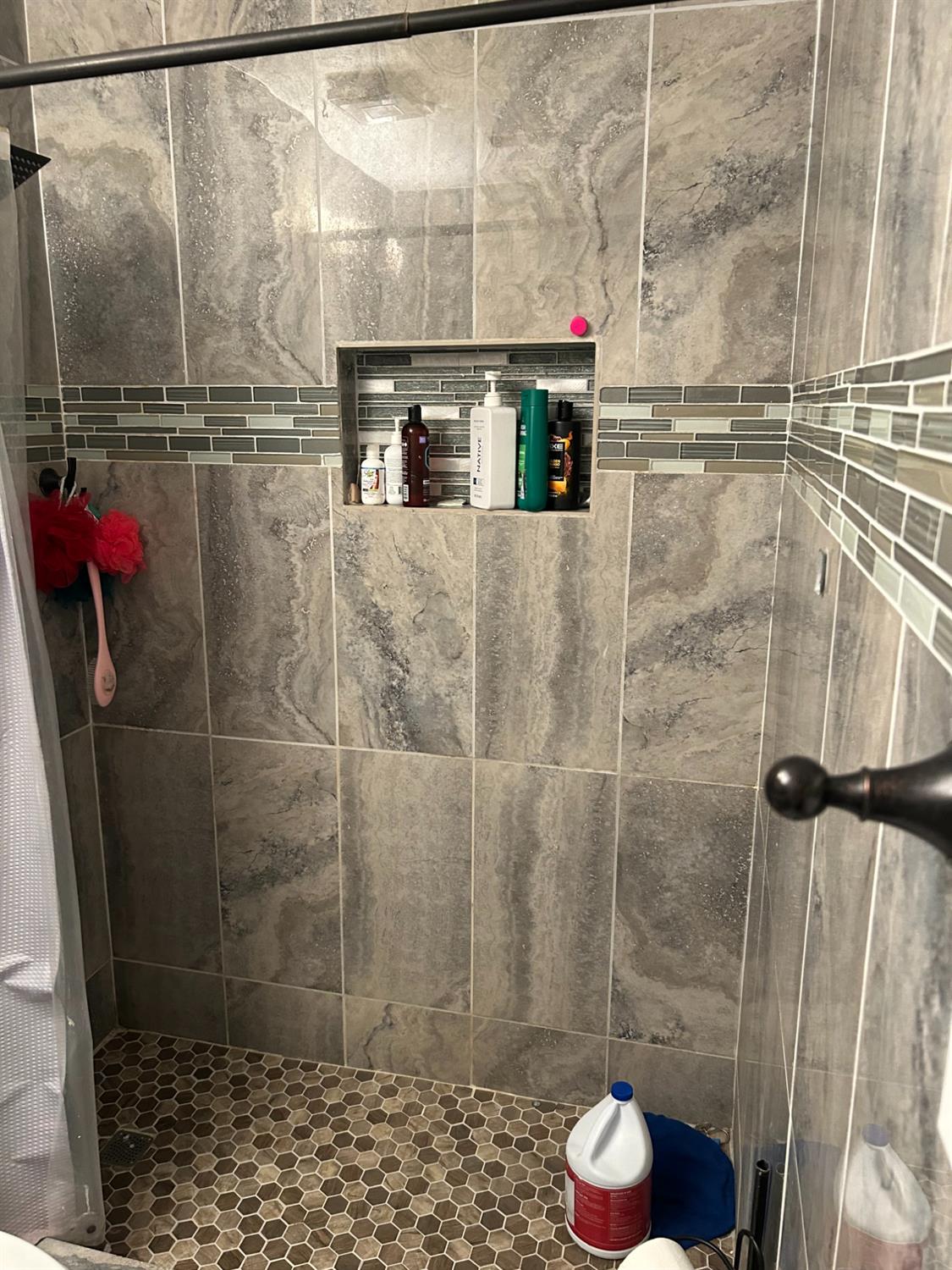 629 E Fort Modesto, CA 95354 - Photo 11 of 16 a bathroom with a shower