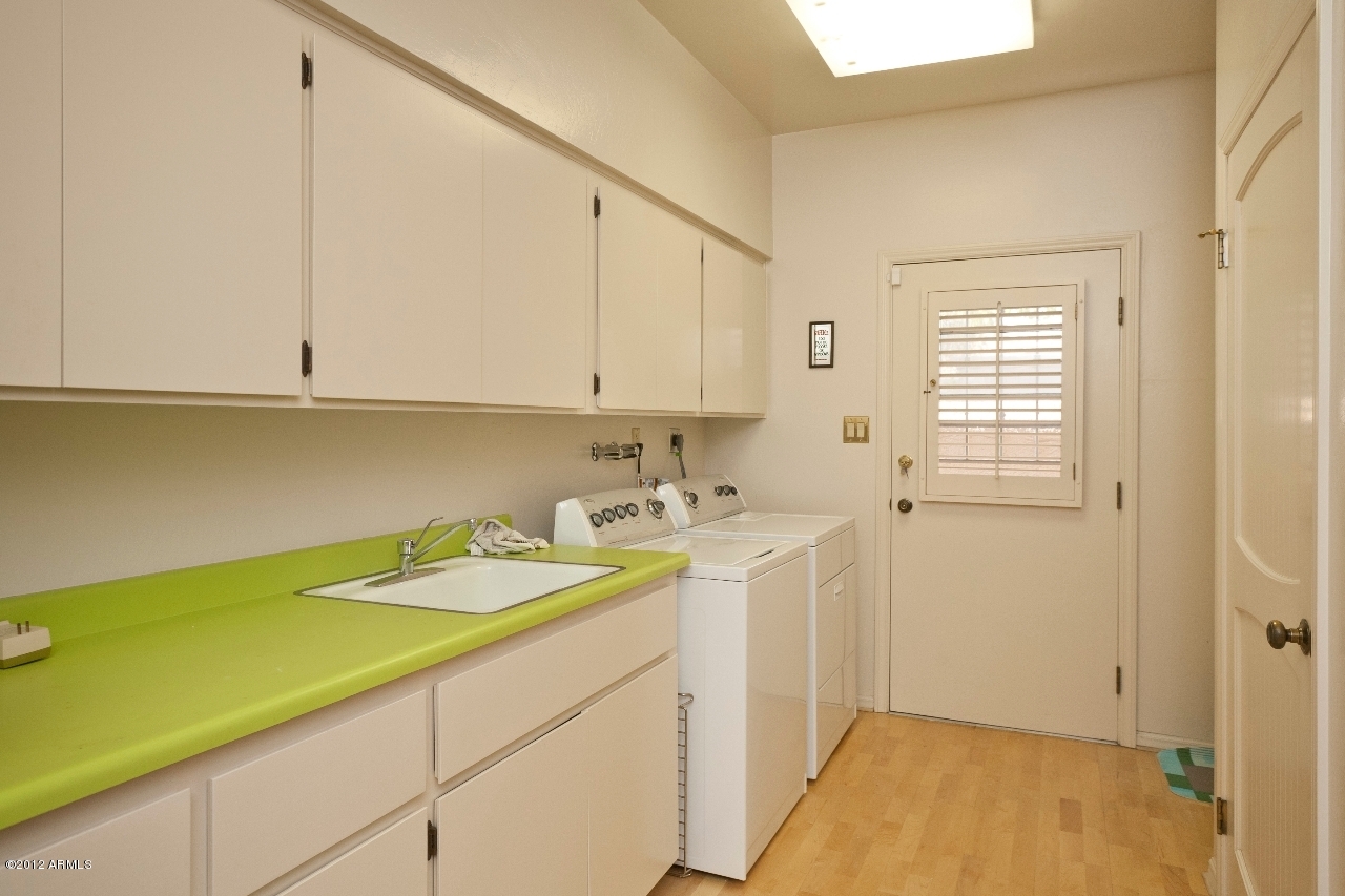 4444 East Camelback Road, Unit 22 Phoenix, AZ 85018 - Photo 20 of 26 a room with a sink and cabinets
