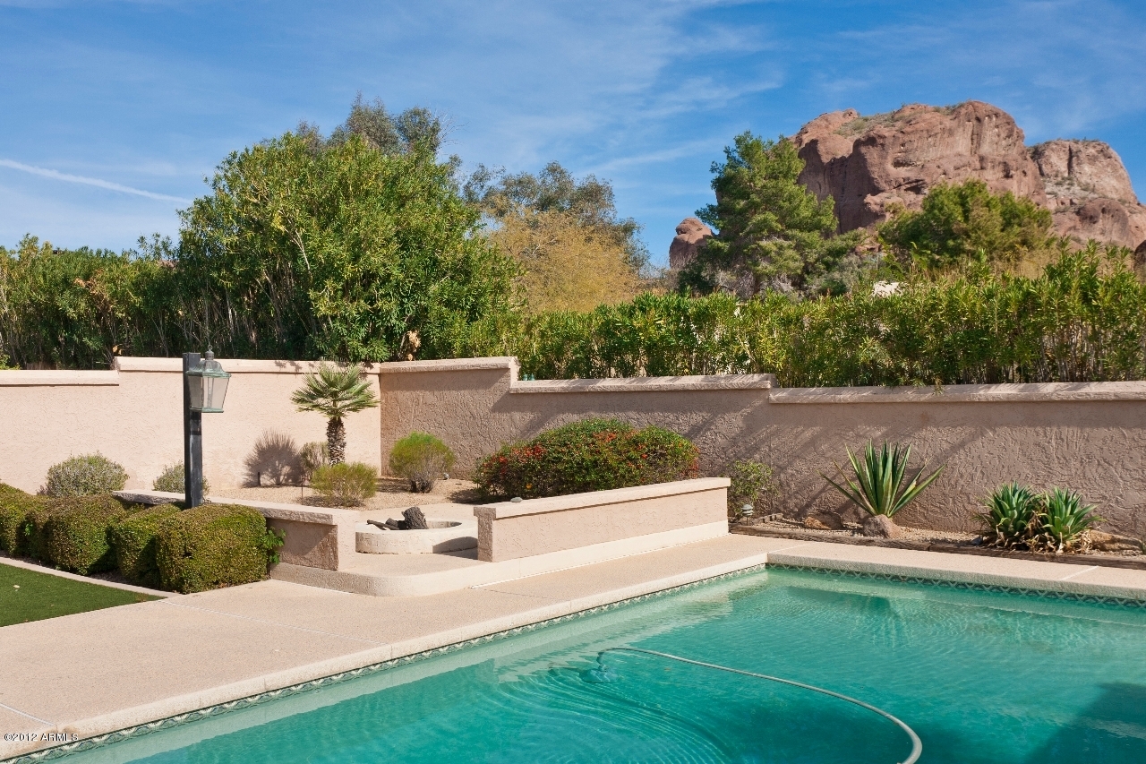 4444 East Camelback Road, Unit 22 Phoenix, AZ 85018 - Photo 24 of 26 a view of a yard with an outdoor seating