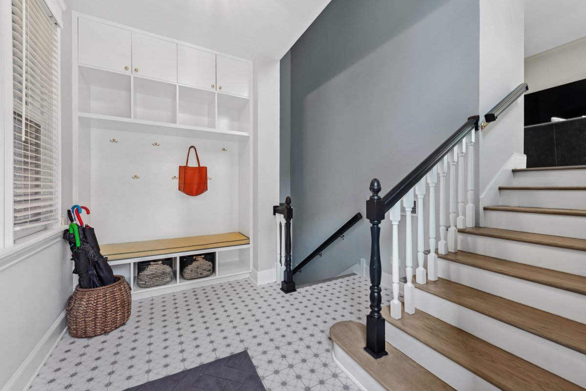 2661 North Dayton Street Chicago, IL 60614 - Photo 13 of 41 a view of dining room and stairs with wooden floor