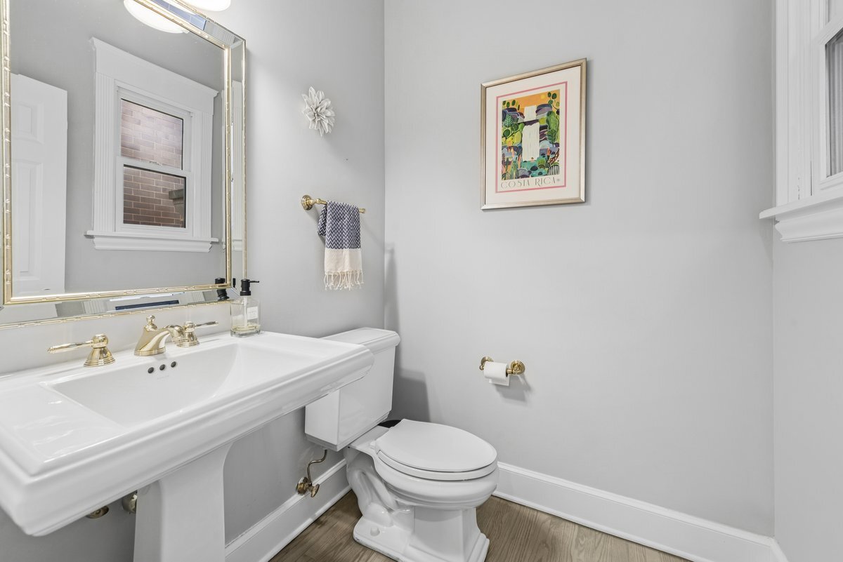 2661 North Dayton Street Chicago, IL 60614 - Photo 14 of 41 a bathroom with a sink mirror and toilet
