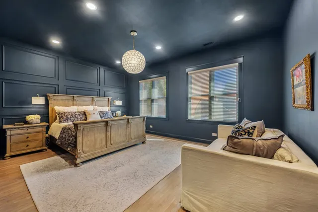 a bedroom with furniture and window