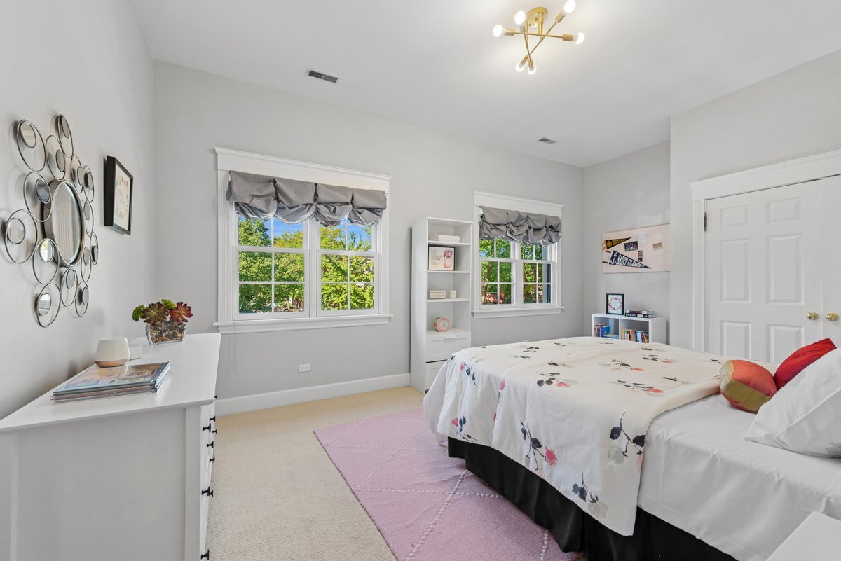 2661 North Dayton Street Chicago, IL 60614 - Photo 19 of 41 a bedroom with a bed and a window