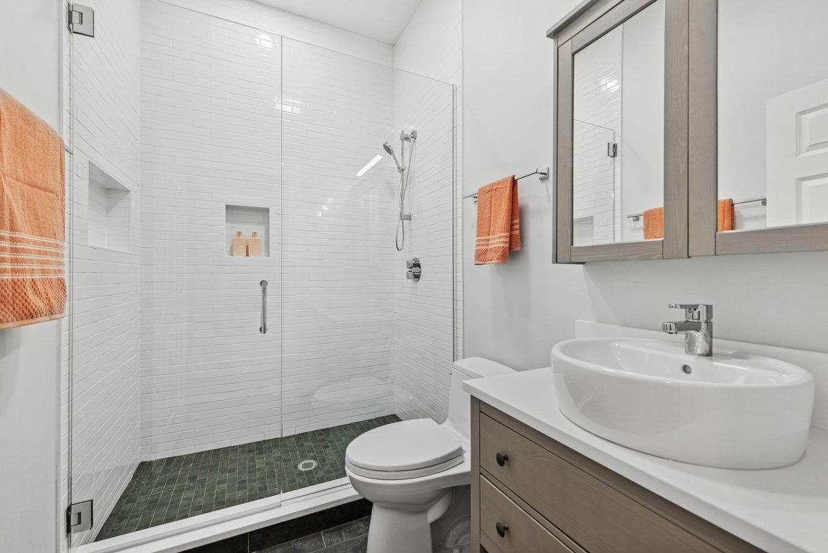 2661 North Dayton Street Chicago, IL 60614 - Photo 23 of 41 a bathroom with a sink toilet and shower