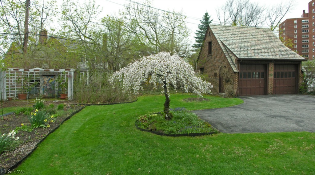 2830 Coventry Road Shaker Heights, OH 44120 - Photo 22 of 24 Rear yard with 2 car brick garage and pergola