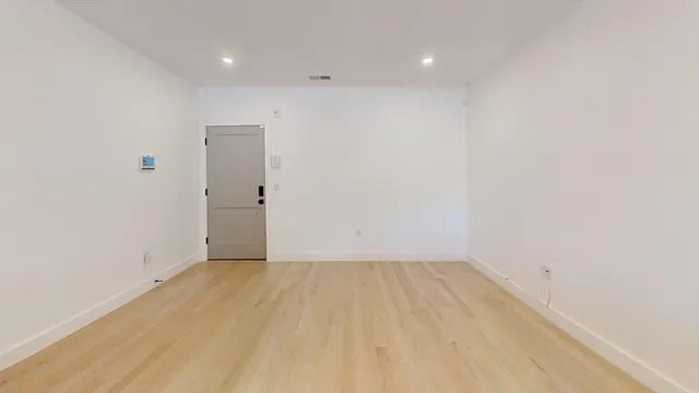 a picture of a bench in front of a door