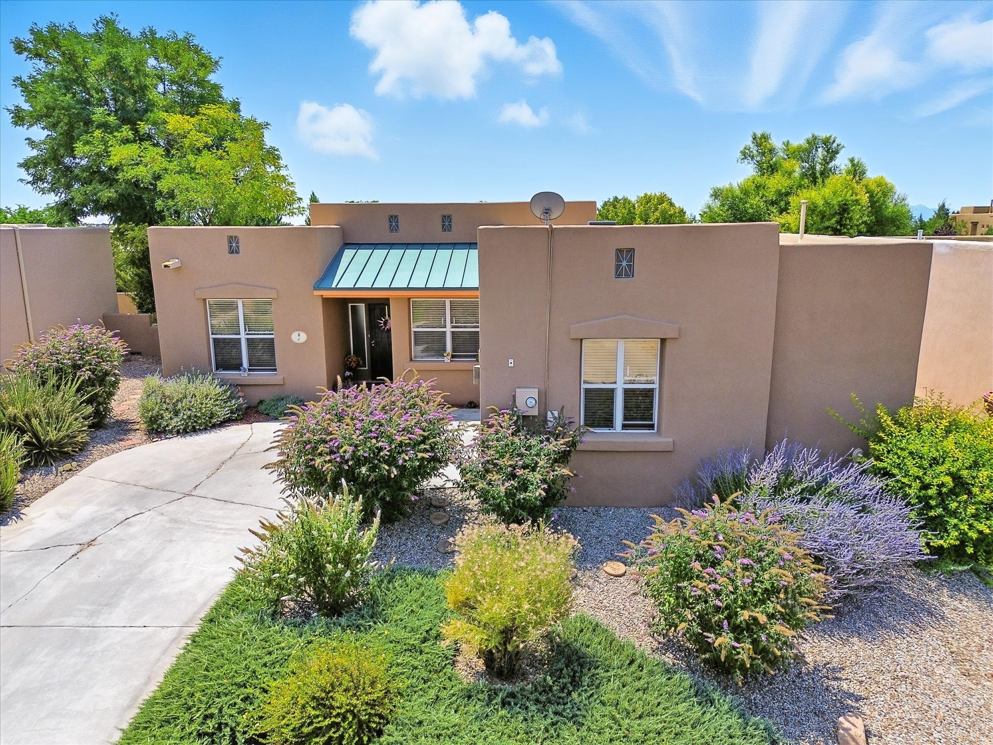 4 Autumn Light Place Santa Fe, NM 87508 - Photo 1 of 1 FACADE OF THE HOUSE