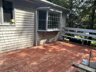 273 Huckins Neck Road Centerville, MA 02632 - Photo 15 of 18 a view of backyard with deck