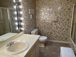 273 Huckins Neck Road Centerville, MA 02632 - Photo 10 of 18 a bathroom with a sink a toilet and shower