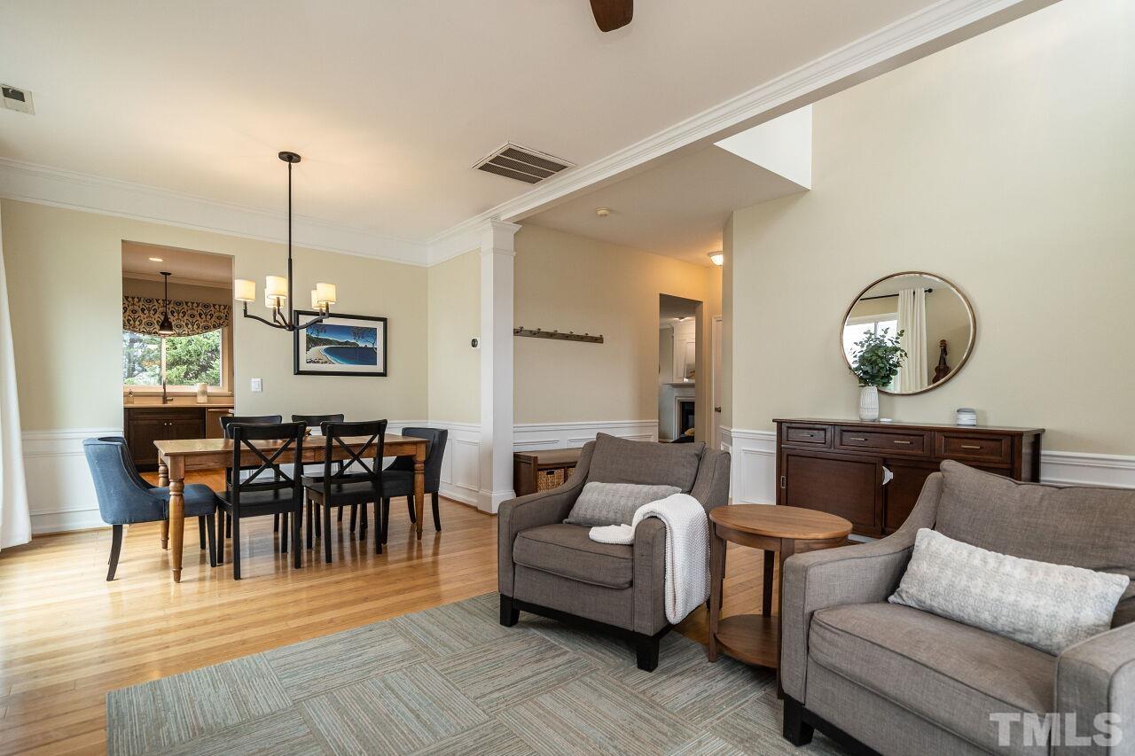 7443 Lagrange Drive Raleigh, NC 27613 - Photo 6 of 28 a living room with furniture and a wooden floor