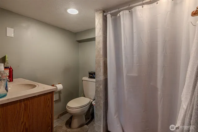 a bed room with a bed and a couch