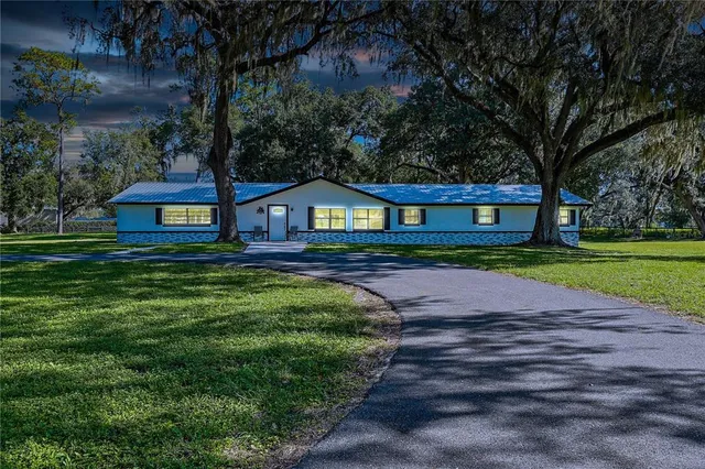 a house with garden in front of it