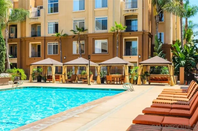 a front view of building with yard