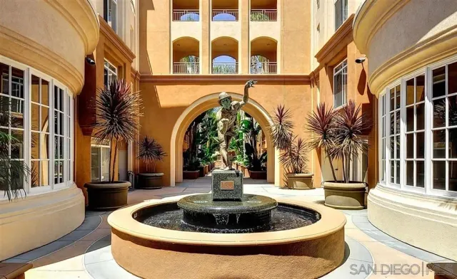 a water fountain in front of a building
