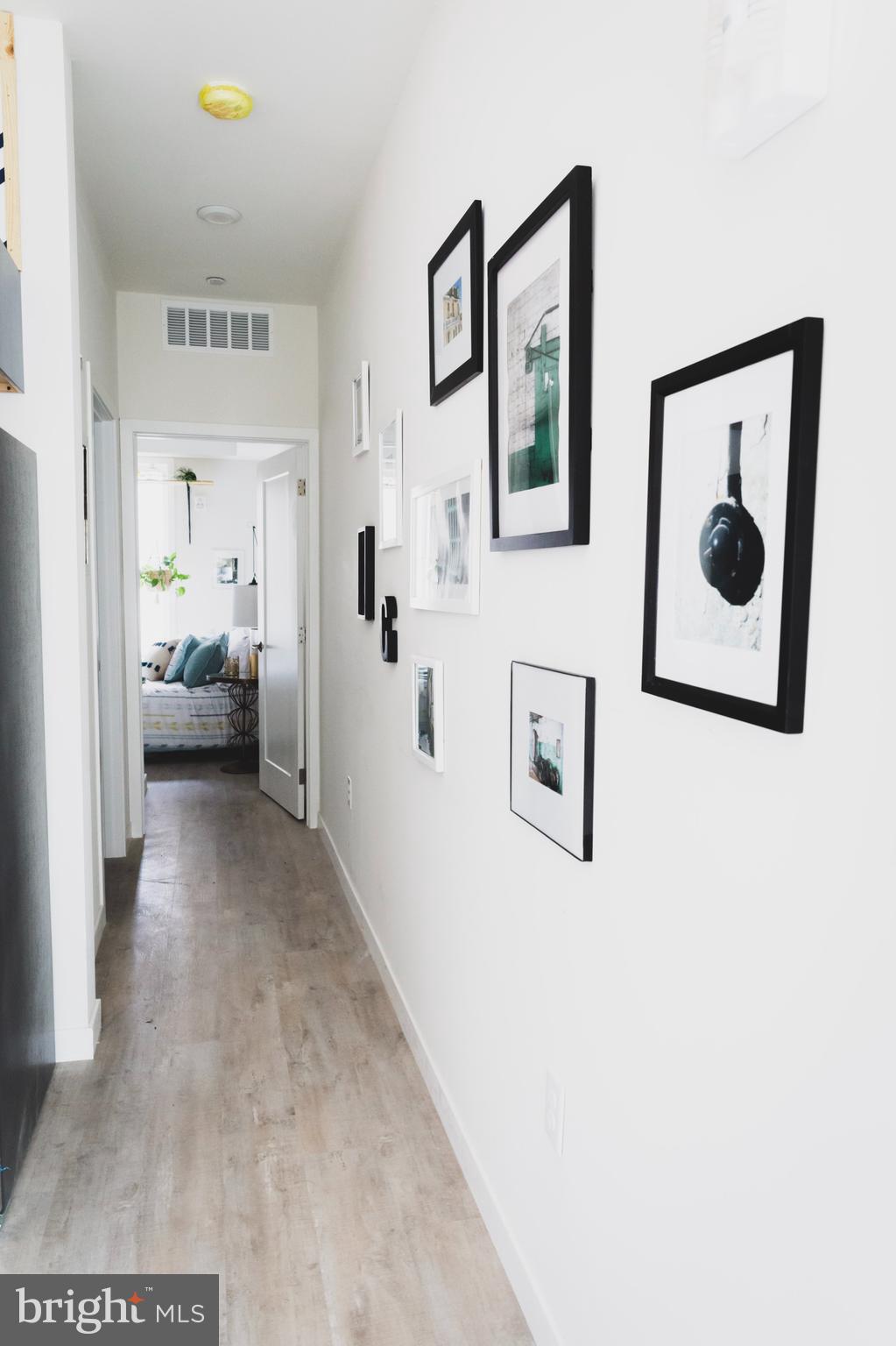 4537 Wayne Avenue, Unit B Philadelphia, PA 19144 - Photo 11 of 16 a view of a hallway with couch