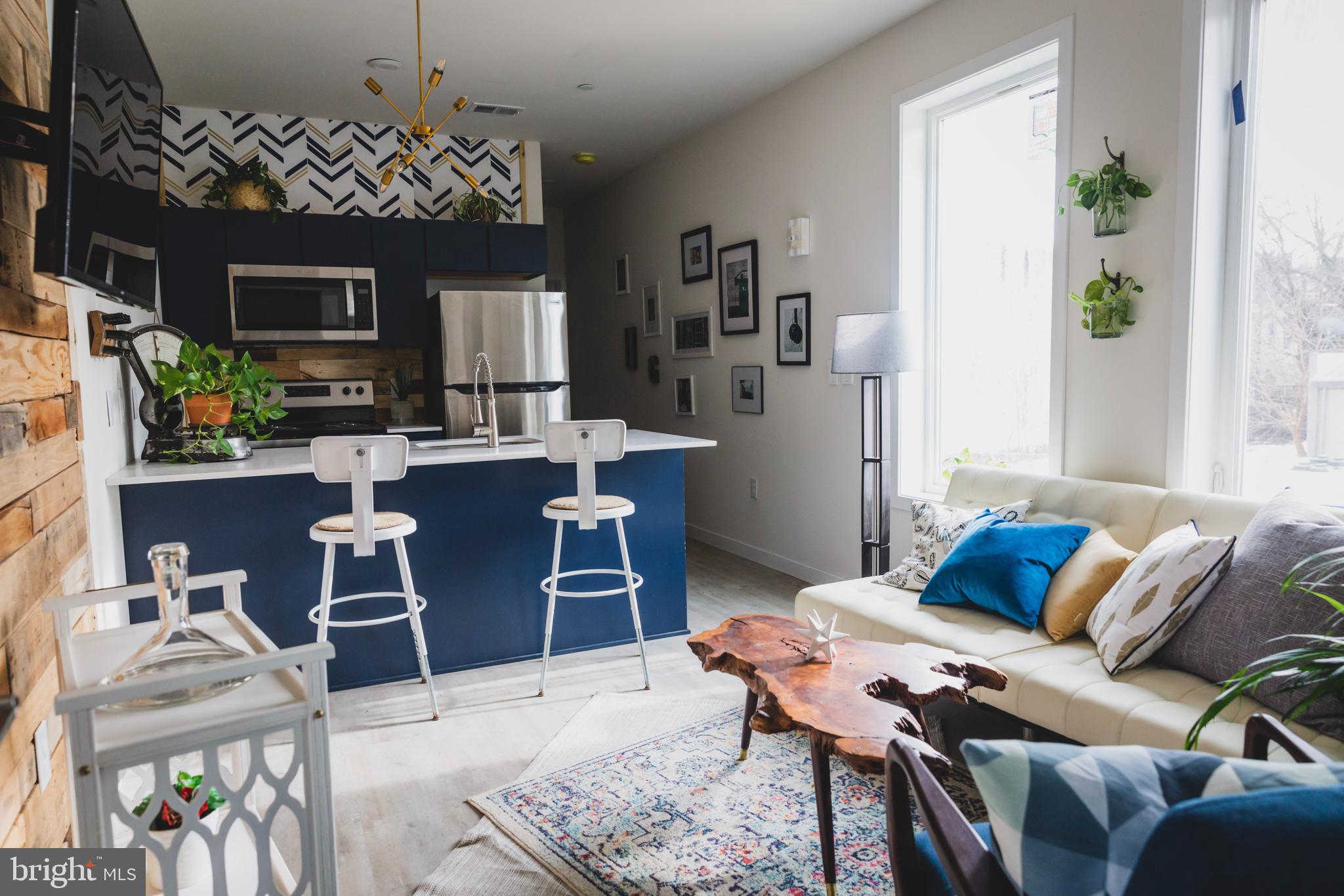 4537 Wayne Avenue, Unit B Philadelphia, PA 19144 - Photo 5 of 16 a view of a dining room with furniture