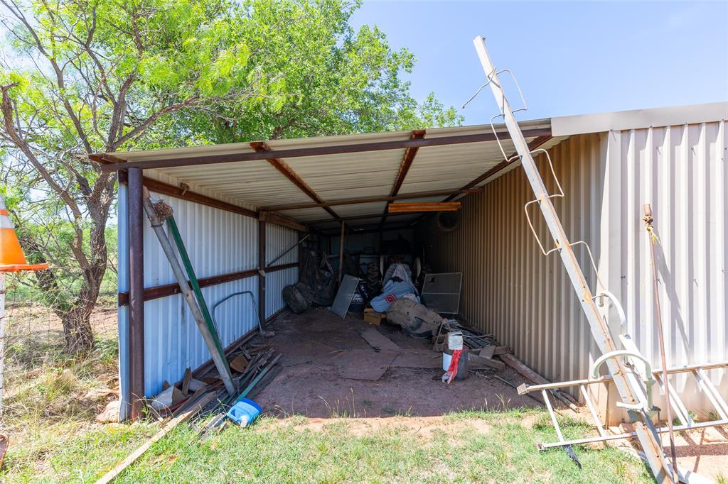6702 West Lake Road Abilene, TX 79601 - Photo 8 of 21 a view of wooden deck in front of house