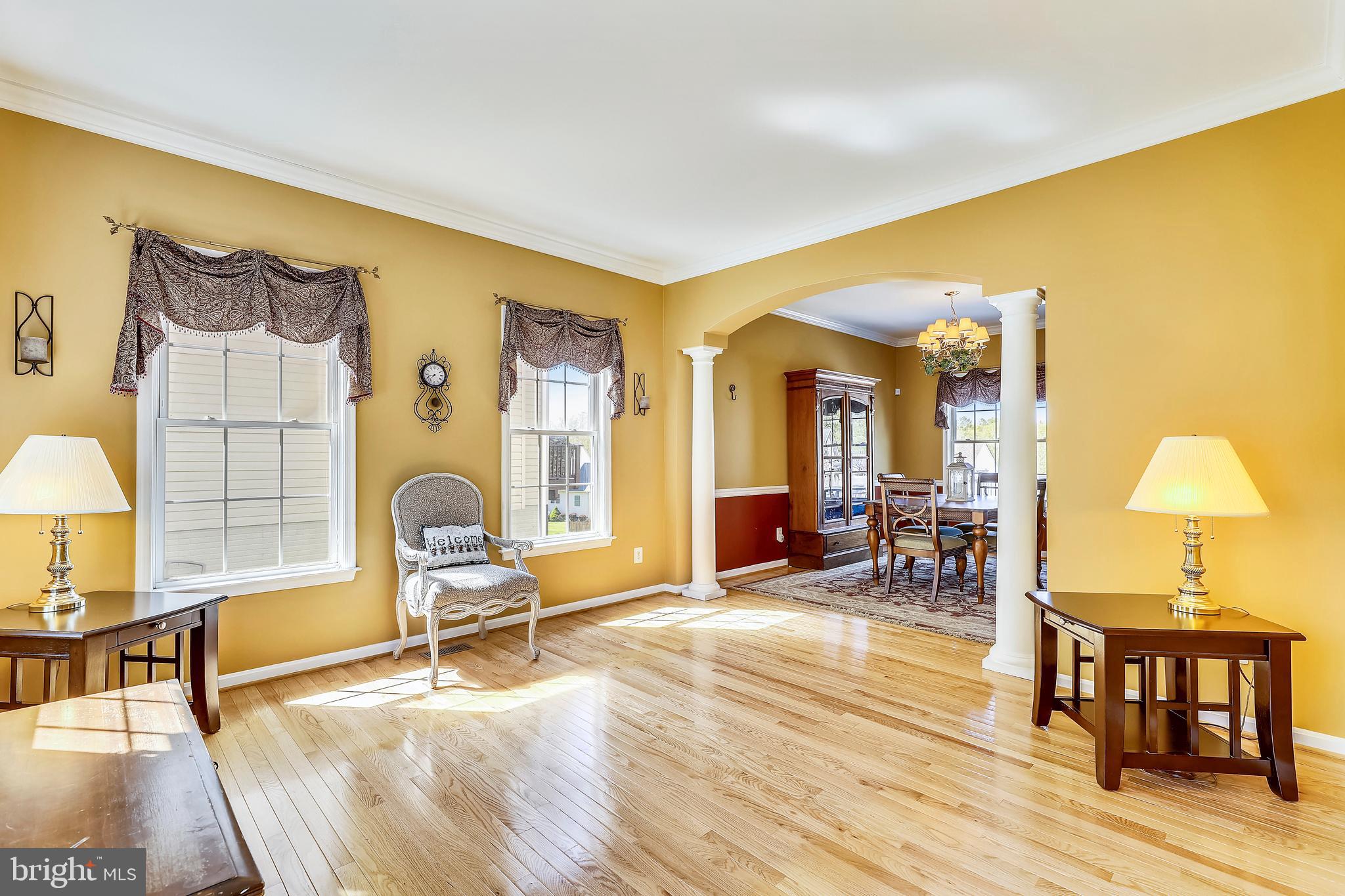 4800 White Marsh Road Baltimore, MD 21237 - Photo 10 of 39 Living room with Crown Molding and Columns