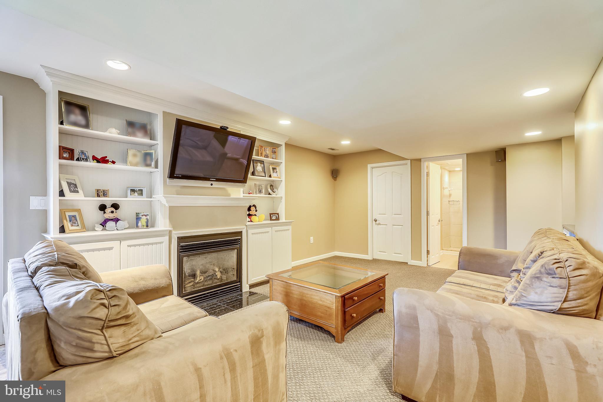 4800 White Marsh Road Baltimore, MD 21237 - Photo 27 of 39 Gas Fireplace- Custom Built In Cabinetry