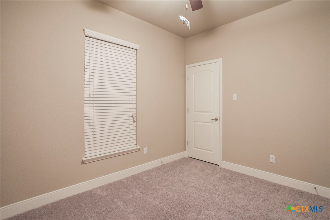 549 Wills Point Way Belton, TX 76513 - Photo 20 of 31 an empty room with windows