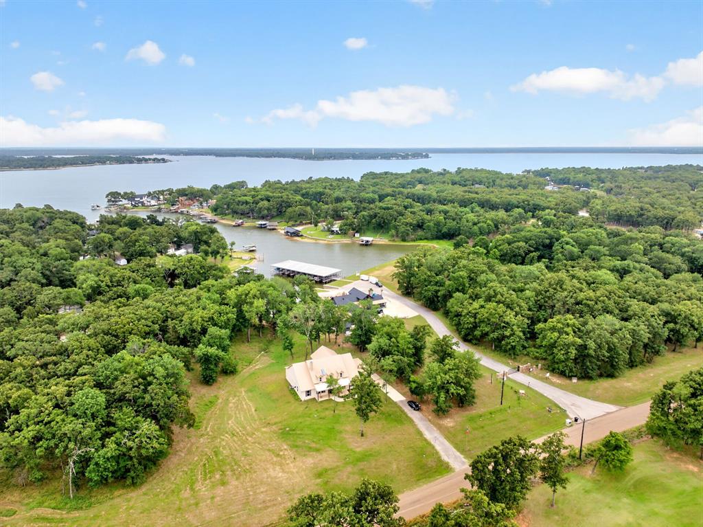 5230 Esquire Estates Road Mabank, TX 75156 - Photo 37 of 39 Aerial view showcasing a water frontage property