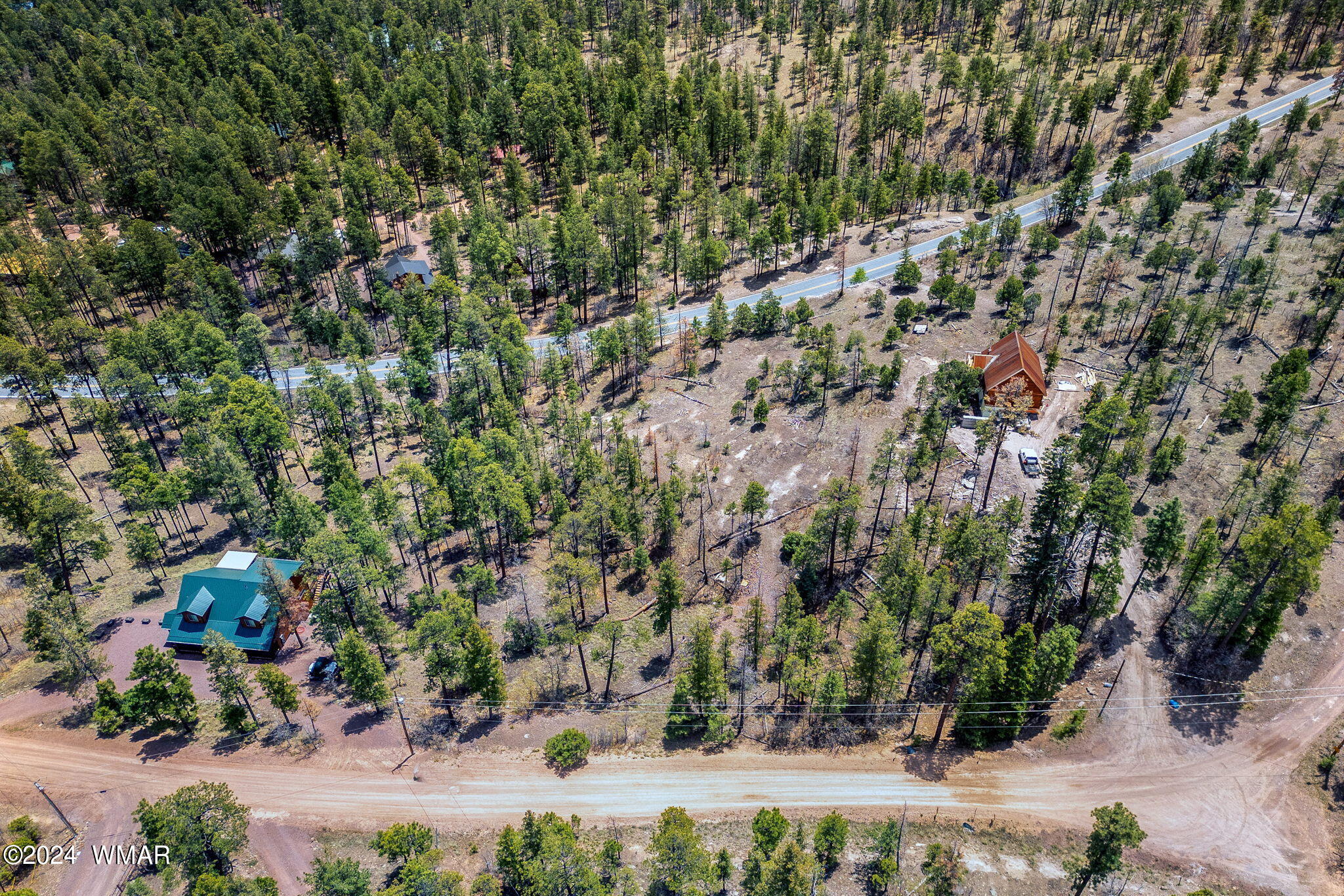 9 2076 Alpine, AZ 85920 - Photo 8 of 15 a view of a city with lush green forest