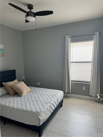 a room with a window and couch