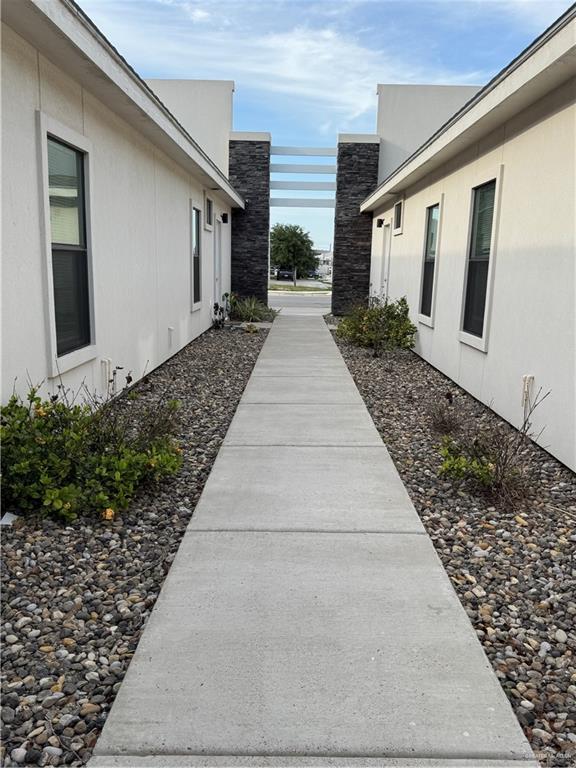 2022 Summerland Lane, Unit 4 Edinburg, TX 78541 - Photo 2 of 31 a view of a house with a pathway