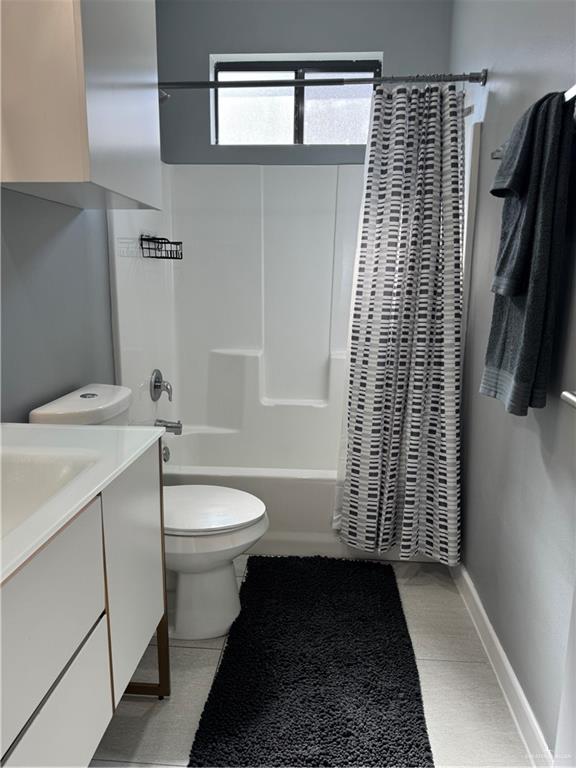 2022 Summerland Lane, Unit 4 Edinburg, TX 78541 - Photo 22 of 31 a bathroom with a sink toilet and shower