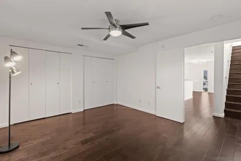 a kitchen with stainless steel appliances granite countertop a refrigerator stove microwave and sink