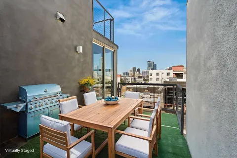 a view of a balcony with city view