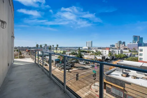 a view of a balcony with city view