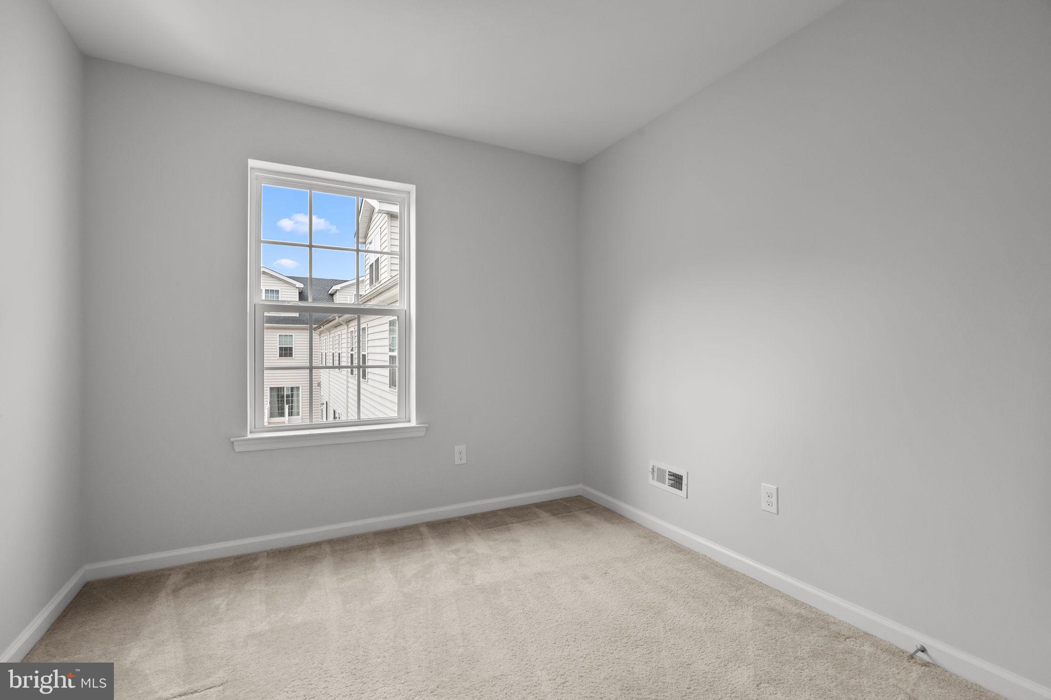 3799 Jacob Stout Road, Unit 2 Doylestown, PA 18902 - Photo 22 of 32 an empty room with a window