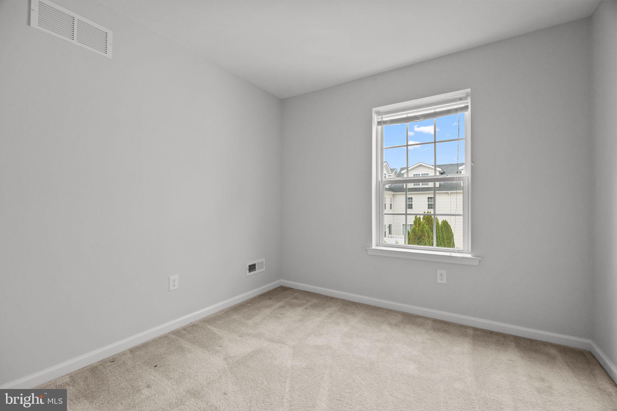 3799 Jacob Stout Road, Unit 2 Doylestown, PA 18902 - Photo 23 of 32 an empty room with a window
