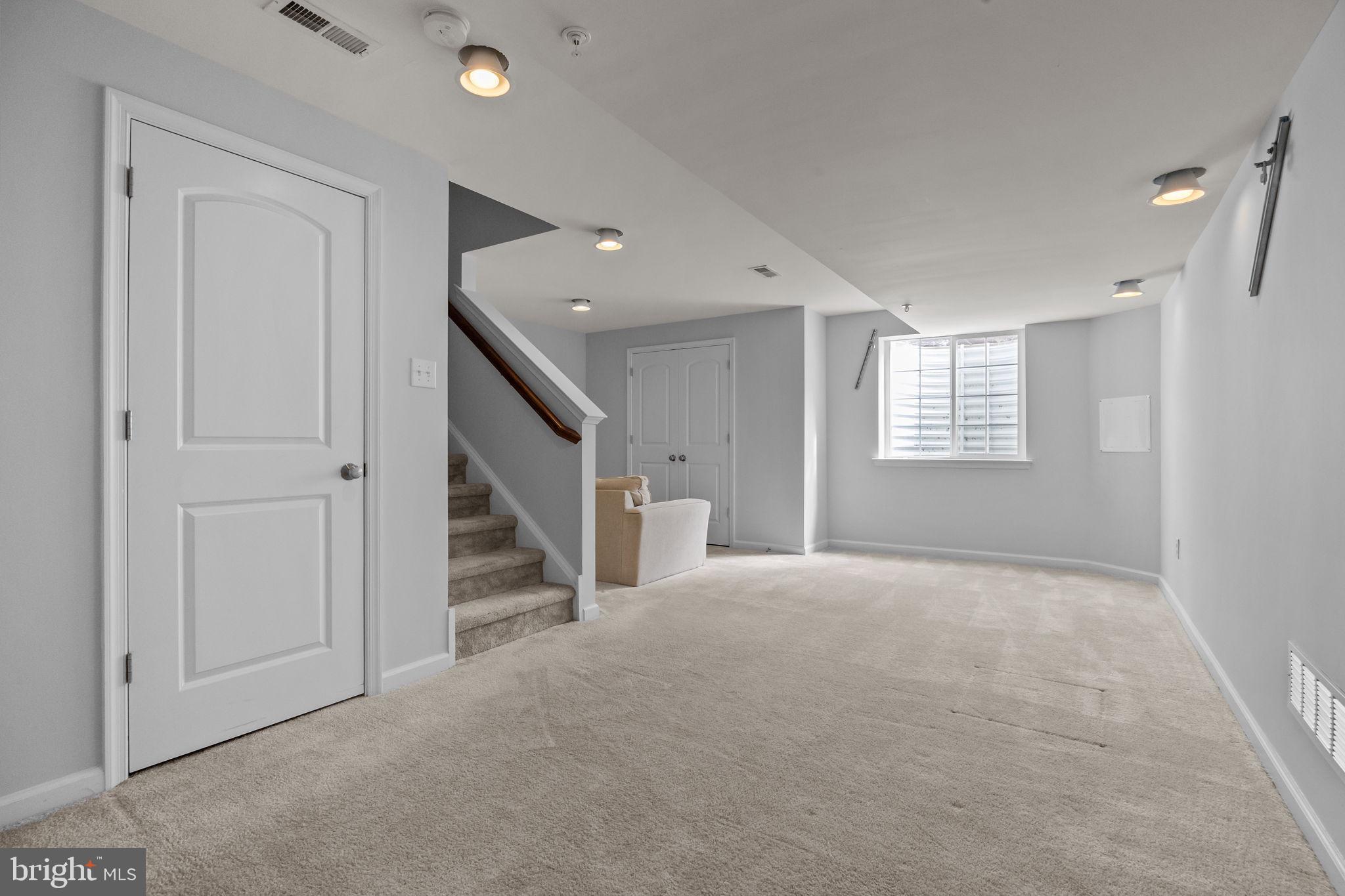 3799 Jacob Stout Road, Unit 2 Doylestown, PA 18902 - Photo 26 of 32 a view of an empty room with a window