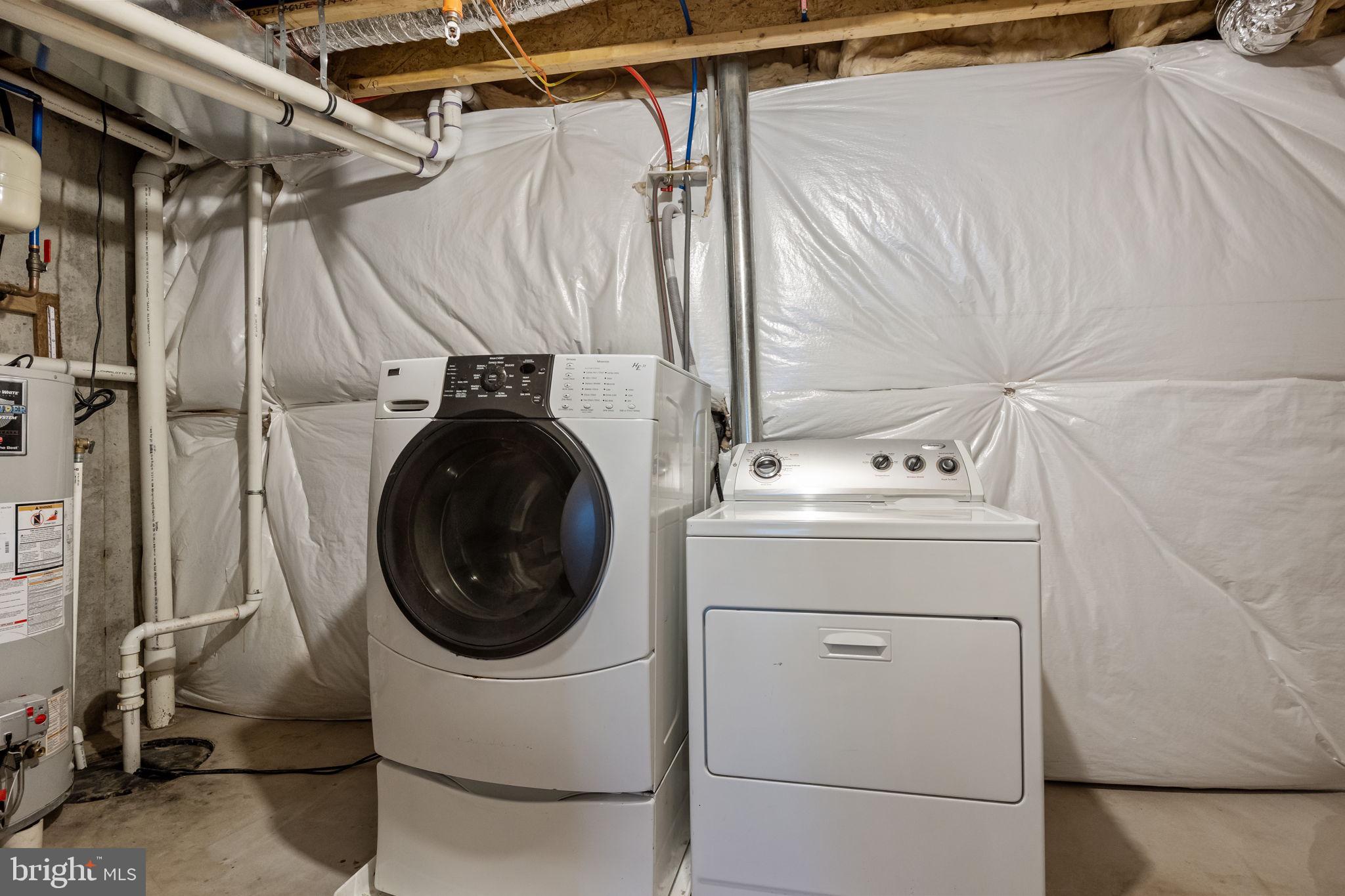 3799 Jacob Stout Road, Unit 2 Doylestown, PA 18902 - Photo 28 of 32 a utility room with dryer and washer