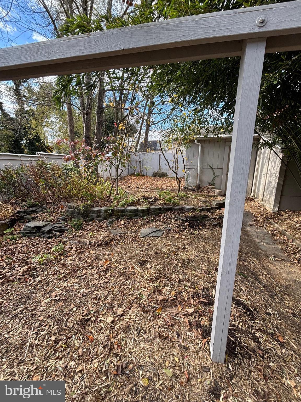 26 Walnut Street Bridgeton, NJ 08302 - Photo 21 of 22 a view of a yard with wooden fence