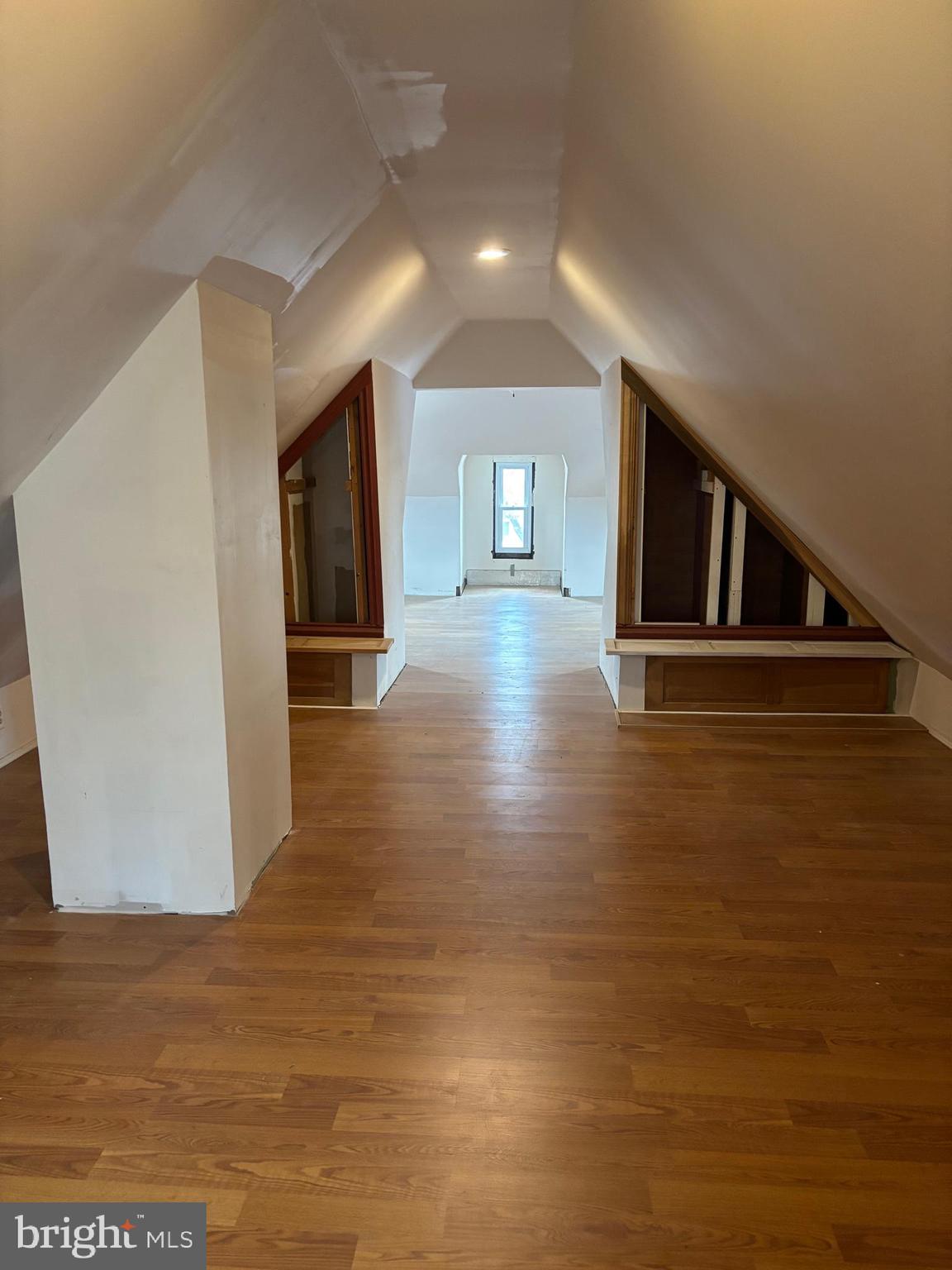 26 Walnut Street Bridgeton, NJ 08302 - Photo 7 of 22 a view of a hallway with wooden floor and staircase