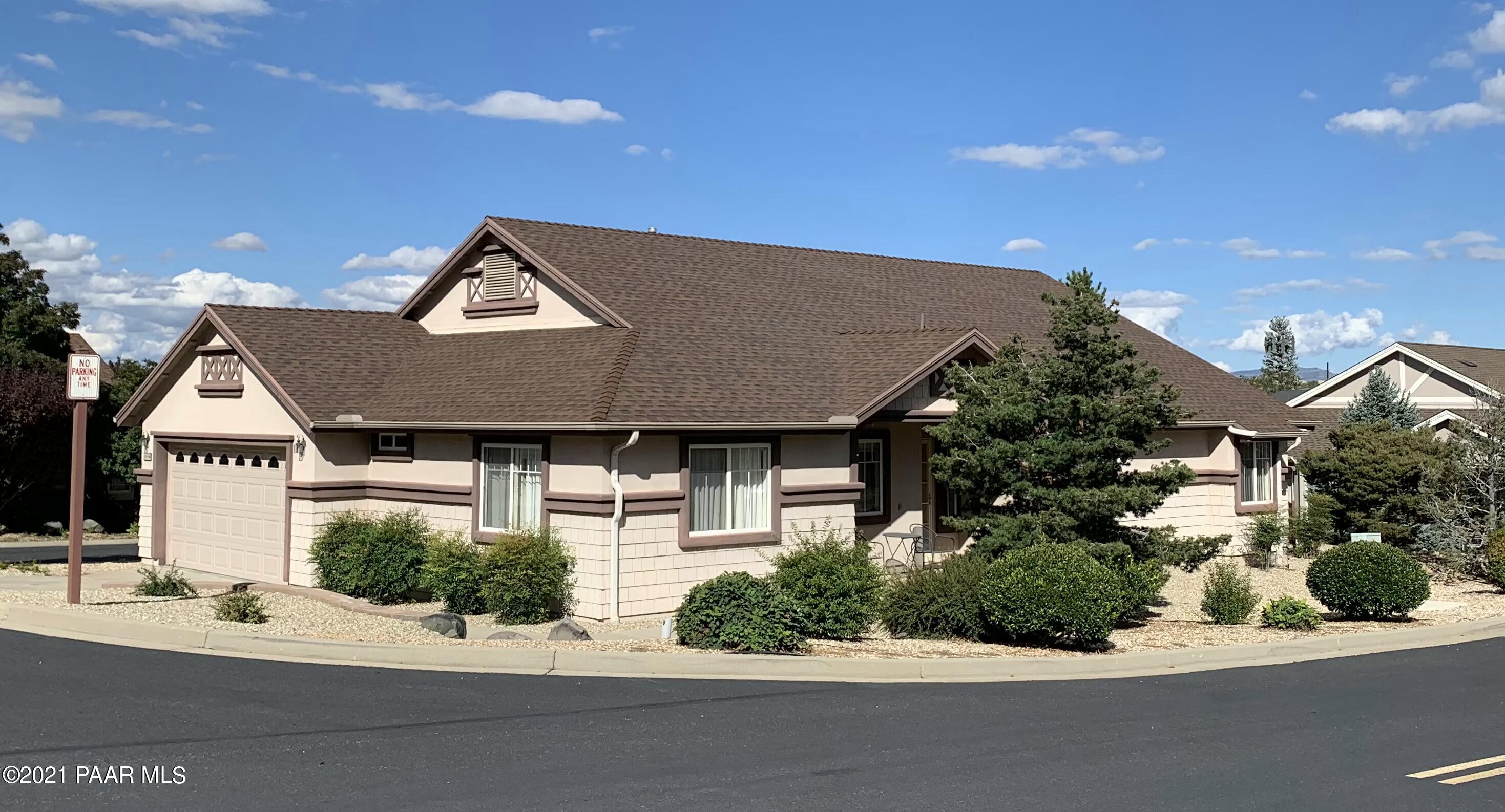 1654 St Andrews Way Prescott, AZ 86301 - Photo 1 of 29 a front view of a house with a yard