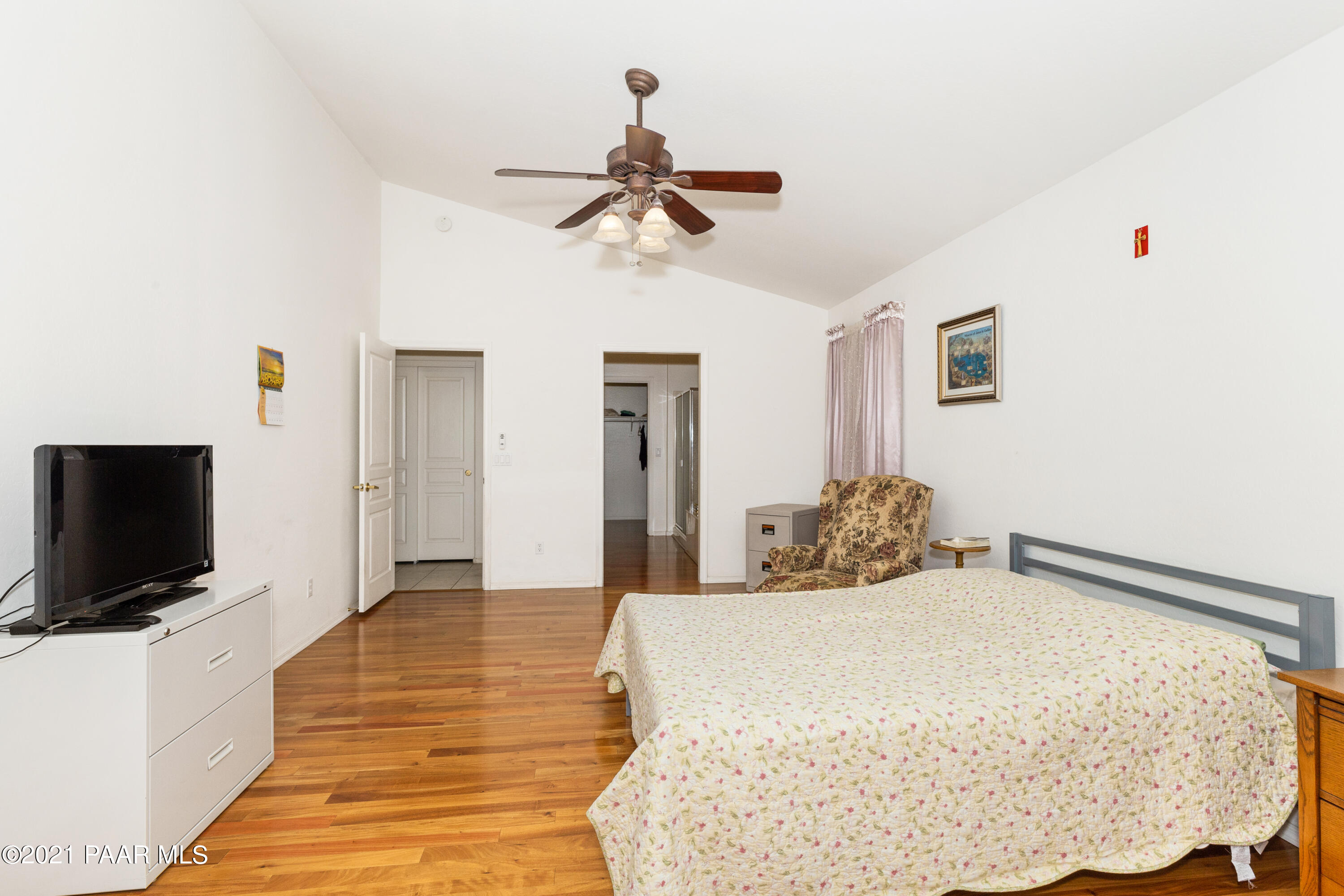 1654 St Andrews Way Prescott, AZ 86301 - Photo 12 of 29 a bedroom with a bed and a flat screen tv