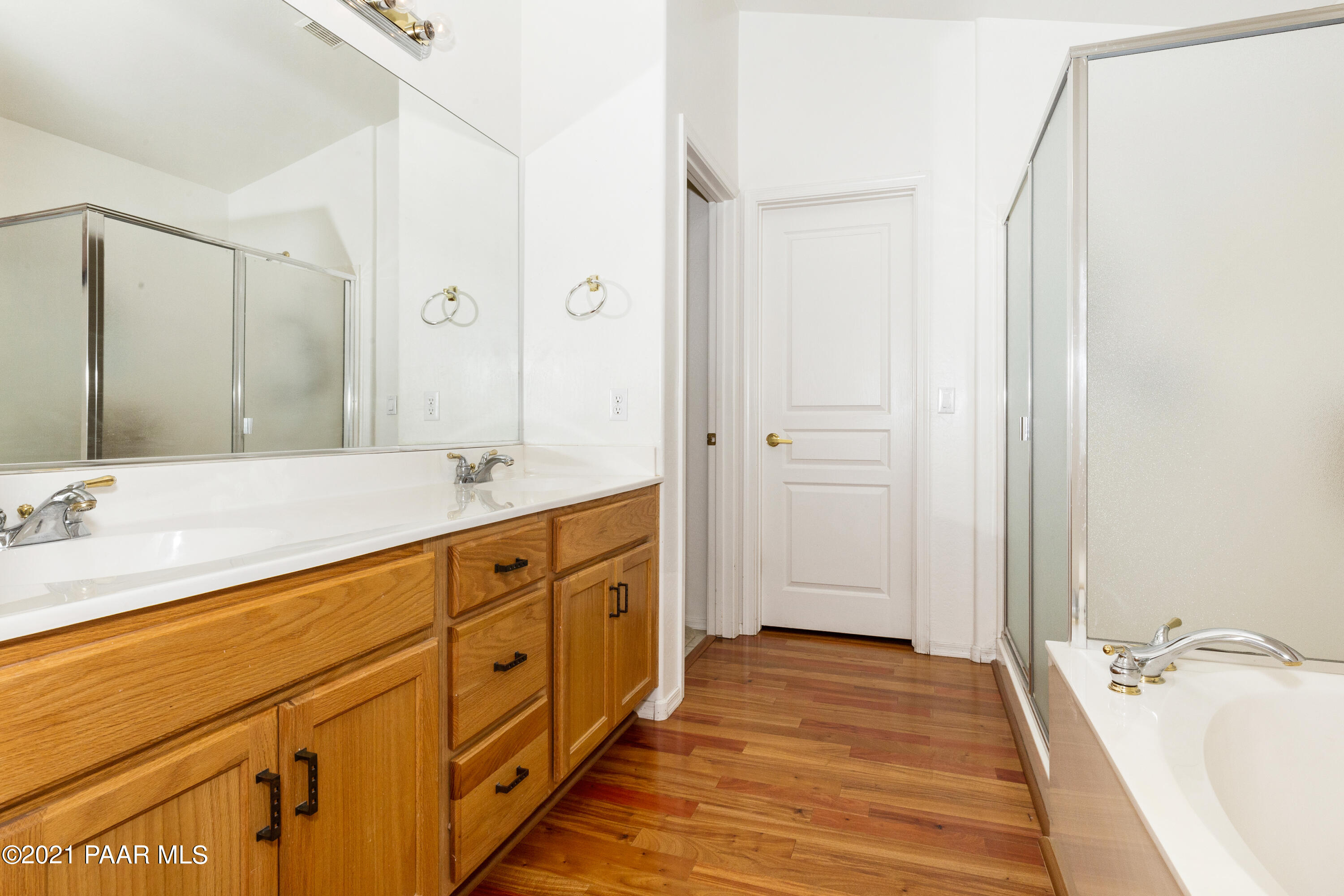 1654 St Andrews Way Prescott, AZ 86301 - Photo 13 of 29 a spacious bathroom with double vanity and mirrors