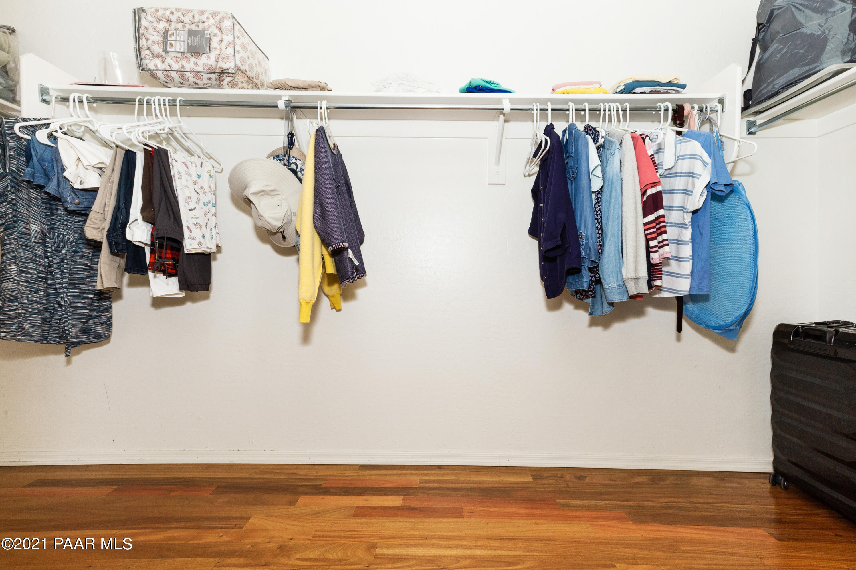 1654 St Andrews Way Prescott, AZ 86301 - Photo 14 of 29 a view of walk in closet with clothes and shoes