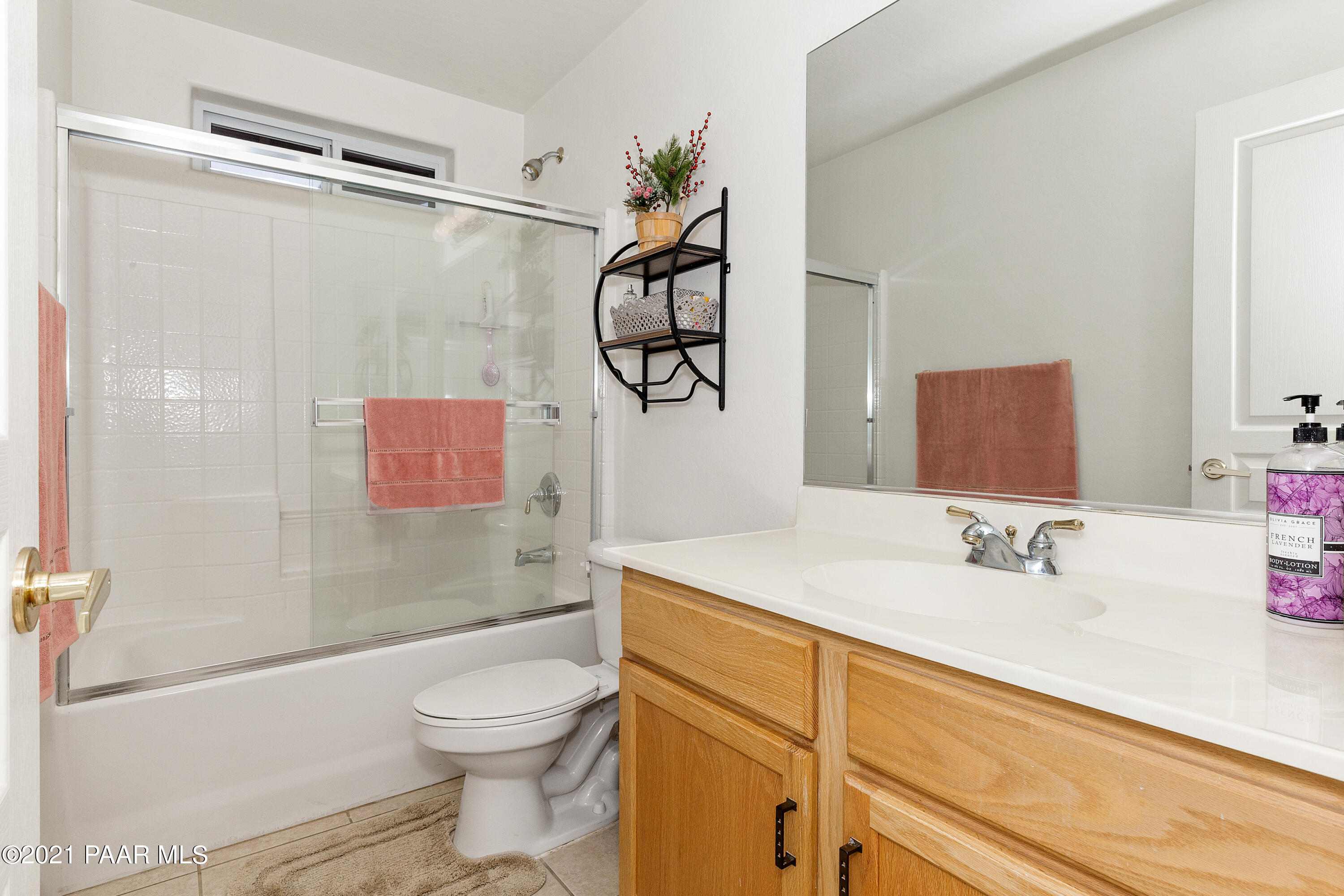 1654 St Andrews Way Prescott, AZ 86301 - Photo 16 of 29 a bathroom with a sink a toilet and shower
